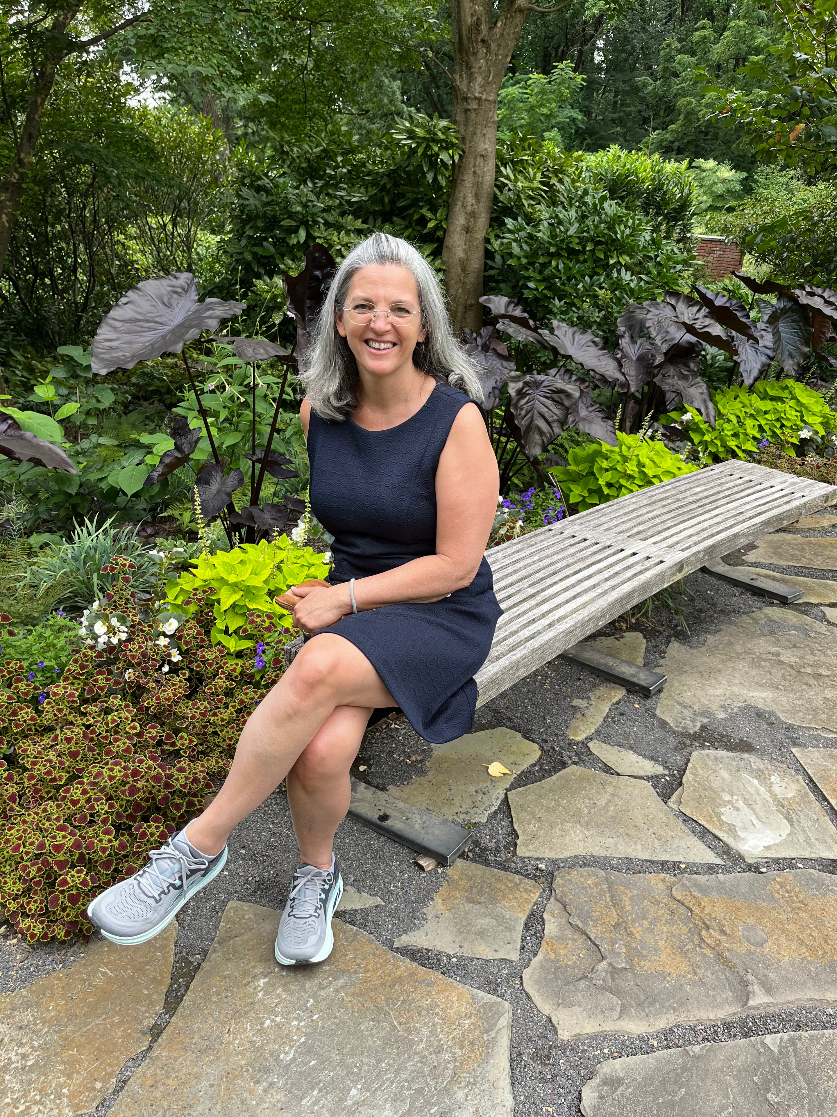 Stacy Rowan seated in the garden